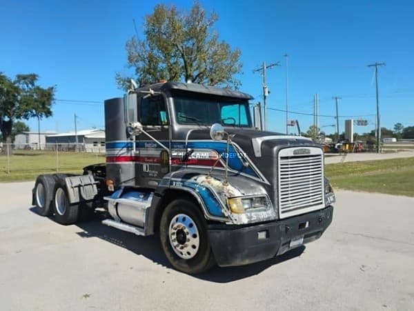 2002 Freightliner FLD112 Day Cab Trucks